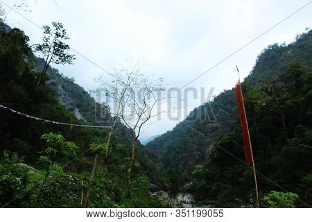 View of blue sky between two mountain