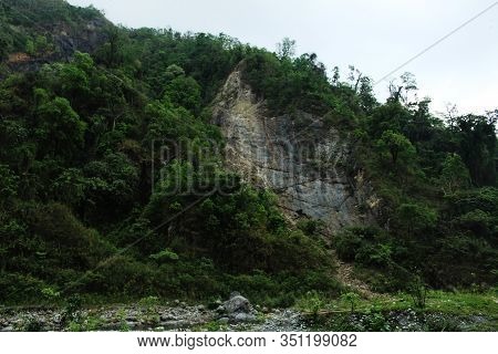 View of green mountain like a wall