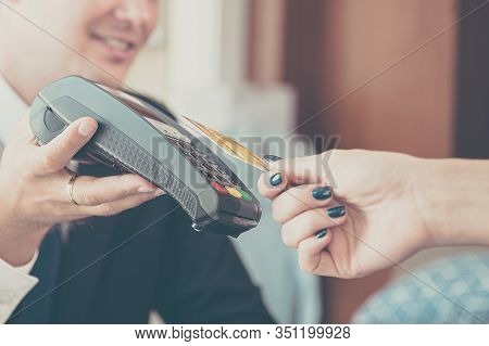 Customer Paying Money With Contactless Credit Card With Nfc Technology. Business Man Holding Credit 