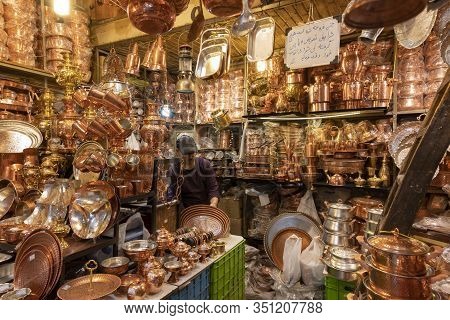 Teheran, Iran - May 21, 2019: Bazaar With Small Shop Of Copper And Metal Pots And Pans In Teheran, I