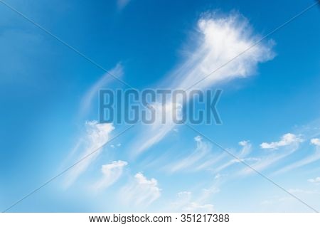 Beautiful White Clouds On A Blue Sky Background. Clouds Like A Brush Strokes