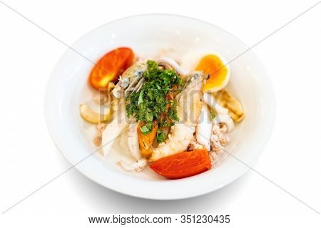 Seafood Thai Noodle Mixxed Together Between Boiled Shrimp, Squid, Pork, Egg And Colourful Vegetable