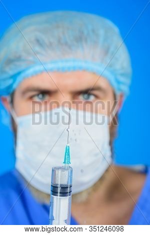 Doctor With Syringe. Coronavirus. Doctor Makes Vaccination. Selective Focus. Close Up. Doctor With S