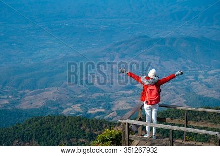 Young People Walking On A Hilltop In Doi Inthanon, Chiang Mai, Thailand