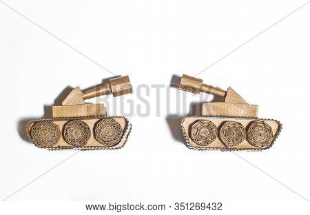 Two Toy Tanks Made By Children From Corrugated Cardboard. Toy Cardboard Tanks Isolated On A White Ba