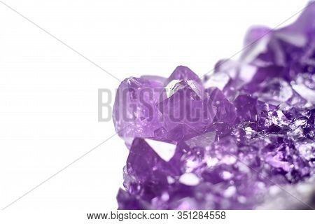 Amethyst Crystals Geode Isolated On White Background. Stock Photo
