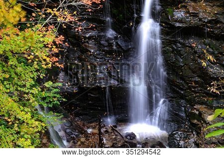 Refreshing Waterfall Hidden Deep In The Autumn Forest