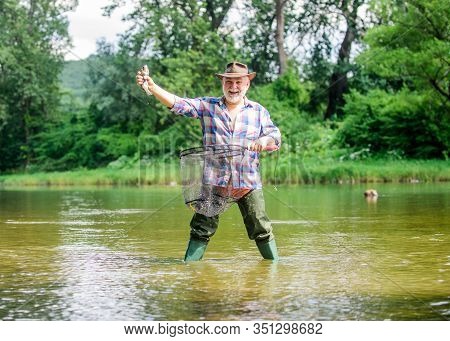 Now Time For Everything. Sport Activity And Hobby. Trout Bait. Retired Bearded Fisher. Big Game Fish
