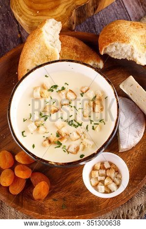 Mushroom Soup With Parsley And Mushrooms In A Plate On The Table