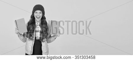 Public Library. Happy Child Hold Library Books Yellow Background. Little Girl Borrow Books In School