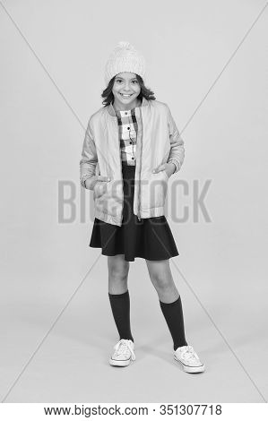 Time To Study. Nice Smile Of Little Schoolgirl. Cheerful Child Yellow Background. Beauty And Fashion