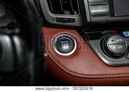 Novosibirsk, Russia -  November 13, 2019:  Toyota Rav-4, Car Engine Push Start Stop Button Ignition 