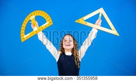 Theorems And Axioms. Smart And Clever Concept. Girl With Big Ruler. School Student Study Geometry. K
