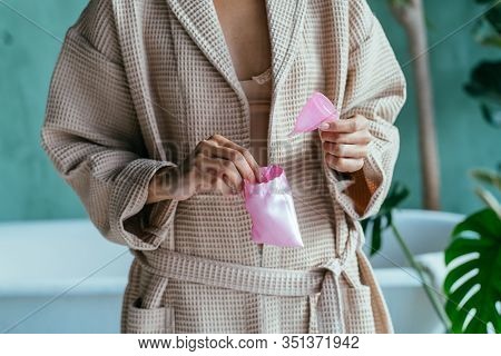 Feminine Hygiene, Save Planet, Eco Friendly, Zero Waste, Reuse Concept. How To Use Menstrual Cup.clo