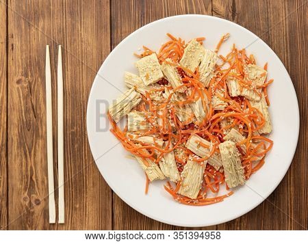 Spicy Chinese Or Korean Yuba Tofu Bamboo And Carrots Salad On Wooden Background