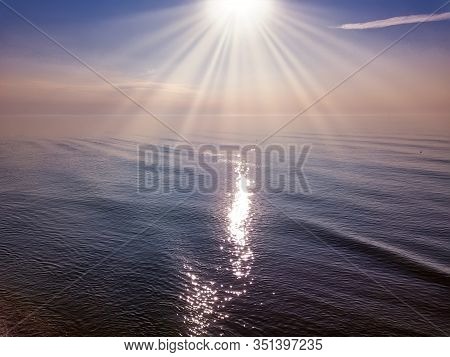 Aerial Panoramic View Of Sunrise Over Sea. Nothing But Sky, Clouds And Water. Beautiful Serene Scene