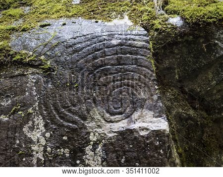 Spiral Petroglyph Carved In Stone In La Zarza Nature Park Archeological Site In Laurel Forest, Lauri