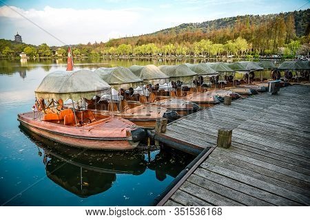 Boat Docked Near Leifeng Pagoda At Xihu West Lake In Hangzhou, China