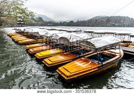 In Winter, Boat Docked Near Leifeng Pagoda At Xihu West Lake In Hangzhou, China
