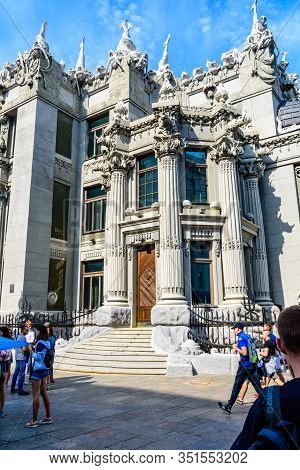 Kiev, Ukraine - August 23, 2019: People Near House With Chimeras In Kiev, Ukraine. Art Nouveau Build