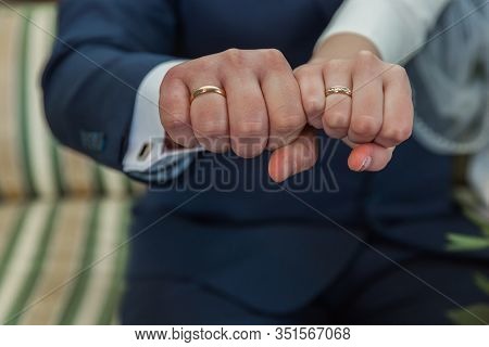 City Cesis, Latvia. Wedding Rings. Women And Men Arms.