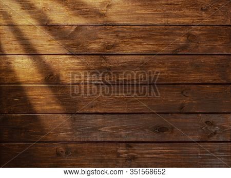 Brown Wooden Boards With Sunbeams. Desk Table Background Texture. Top View