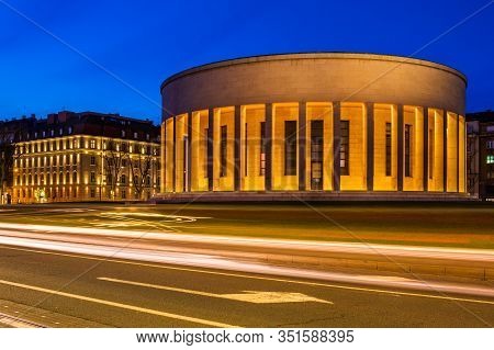 Croatia, City Of Zagreb In The Night, Car Light On The Street And Monumental Column Architecture In 