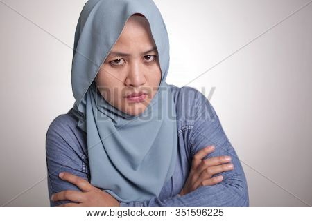 Muslim Woman Looking Cynically