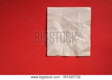 blank spicky note on the red background