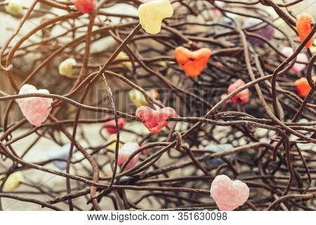 A Chunk Of A Red Heart Shaped Candle Adheres To An Old Rusted Steel Rod.  A Valentine's Day Backgrou