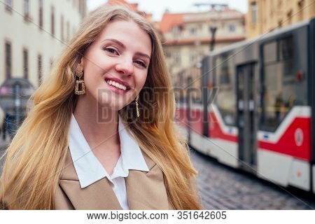 Blonde Woman Stand In Bus Stop And Waiting Trolley In Prague Sity Chezh