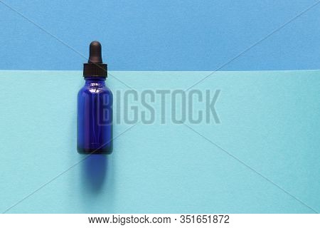 Blue, Bottle, Mint And Blue Colors, Flay Lay. Empty Blue Bottle On A Flat Lay Background. Place For 