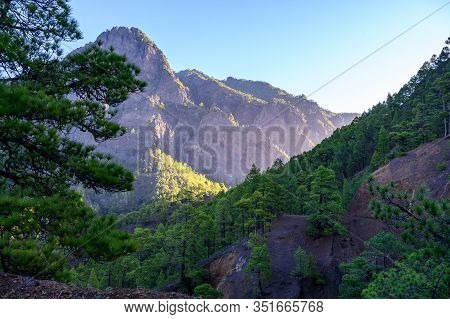 Scenic View On Caldera De Taburiente With Green Pine Forest, Ravines And Rocky Mountains Near Viewpo