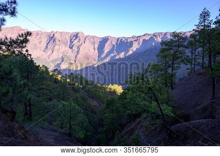 Scenic View On Caldera De Taburiente With Green Pine Forest, Ravines And Rocky Mountains Near Viewpo