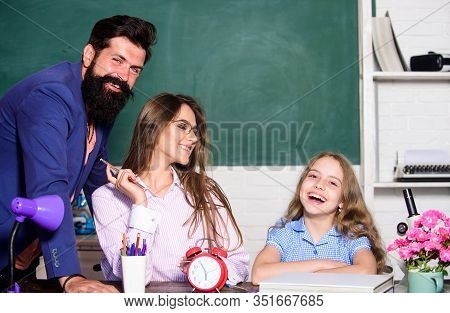 Tutor For Excellence. Extra Classes. Gifted Child. Little Girl Studying With Team Of Tutors. Home Tu