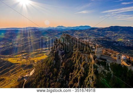 Beautiful Aerial Scenic View Of Guaita Fortress On Monte Titano With San Marino City In Background A