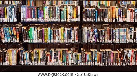 Mackay, Queensland, Australia - February 2020: Library Books On Shelves For Public Use At Dudley Den