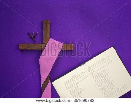 Good Friday, Lent Season, Ash Wednesday And Holy Week Concept. A Christian Cross, Three Rusty Nails 