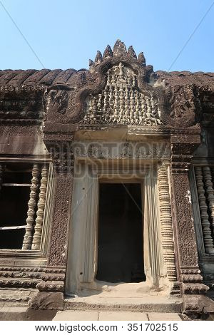Entrance To Temple Ruins With Detail Mural And Bas Relief In Ancient Angkor Wat, Hindu Culture And R