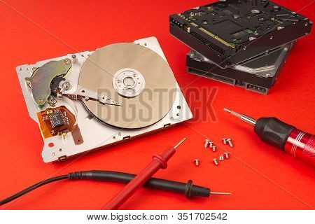 Hdd - Hard Disk Drive. Hard Disk Repair Concept. The Hard Drive Is Designed To Store Data Of All Man