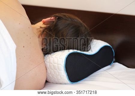 Man Sleeping On Orthopedic Pillow, Healthy Sleep With Chondrosis