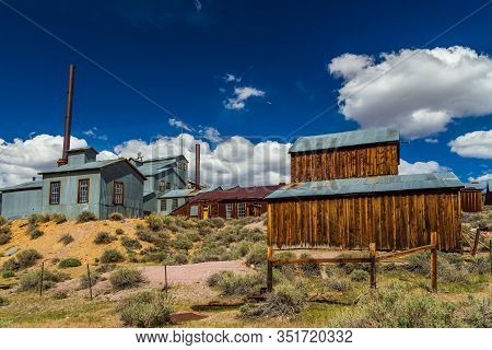 View Of The Bodie, Ghost Town. Bodie State Historic Park. Abandoned Wooden Houses And Standard Conso