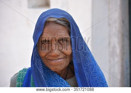 Tikamgarh, Madhya Pradesh, India - February 08, 2020: Closeup Portrait Of An Old Indian Woman At Her