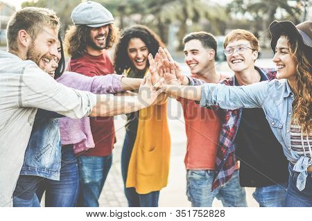 Young Millennials Friends Stacking Hands Together - Happy Students Celebrating Together - Youth Life