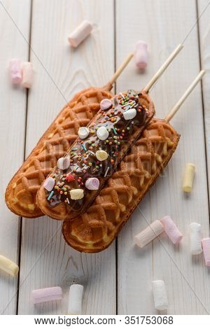 Tasty Cornmeal Dessert Sticks On Wooden Background
