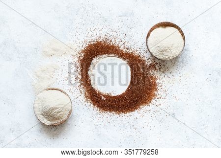 Teff Flour In Bowls And Teff Grain Top View