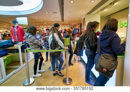 HONG KONG - JANUARY 22, 2019: people queue at Bossini shop in Hong Kong.