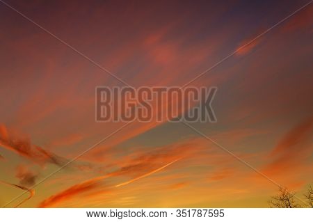 Textured Background With Biautiful Colorful Sunset Sky With Few Clouds For Wallpaper.