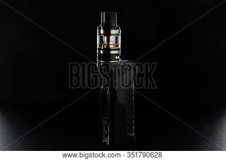 Electronic Cigarette Or Vaping Device On Black Background