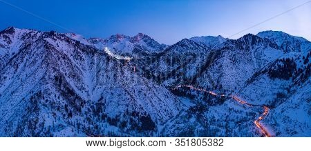 Panorama Of The Mountains With The Road To The Ski Resort Of Chimbulak. Late Winter Evening